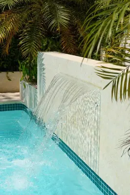 a water fountain in a swimming pool at New! Gorgeous Portillo Beach Villa W Pool & Staff in Abra Grande