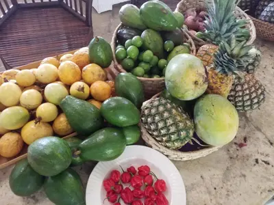 a bunch of fruits and vegetables on a table at Villa Los Gorgones in Las Galeras
