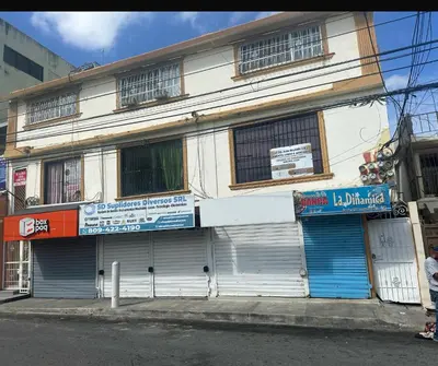 a building on the side of a street at Apartamento cerca de todo en SDE in Santo Domingo