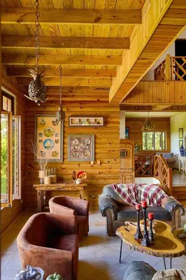 a living room with wooden walls and a wooden ceiling at ®4BR{Wood~Mountain~Villa} @Jarabacoa Heated Pool in Jarabacoa
