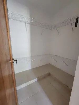 an empty room with a white wall and white floor at Cerro hermoso in Santiago de los Caballeros