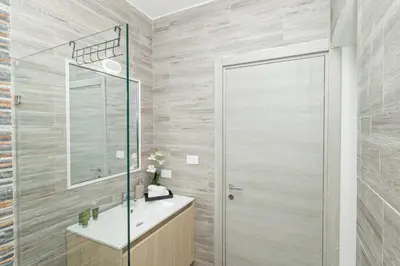 a bathroom with a shower and a sink at Coastal Comfort in Bayahibe 2BR 2BA Carribean Rose in San Rafael del Yuma