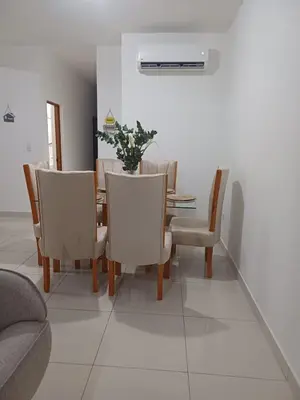 a dining room with a table and chairs at Sunset Apartment Beach Residences Steps from the Beach in Puerto Plata