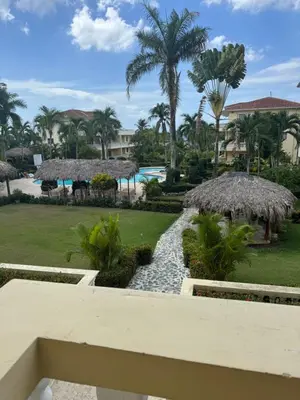 a view from the balcony of a resort at Marvilla - Coastal Condo Poolside & Ocean View in Boca Chica