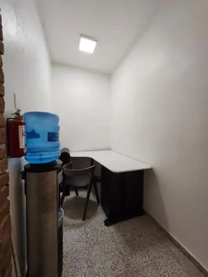 an empty room with a desk and a chair at Apartment in Zona Colonial in Santo Domingo