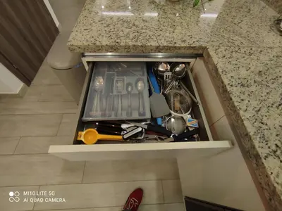 a drawer in a kitchen counter with tools in it at Relax in Style at Hard Rock Hotel Punta Cana Apartment in Punta Cana