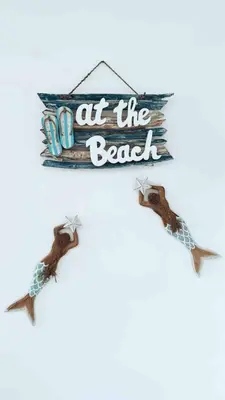 a sign that reads at the beach with two fish at Relax in Style at Hard Rock Hotel Punta Cana Apartment in Punta Cana