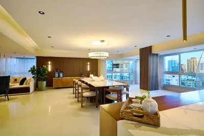 a dining room and living room with a dining table at Acqualina’s View @ Santo Domingo in Santo Domingo