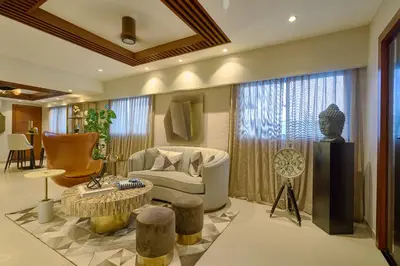 a living room with a couch and a chair at Acqualina’s View @ Santo Domingo in Santo Domingo