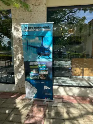 a sign on the side of a building in front of a window at Swim-Up Paradise, AirBB for more info in Punta Cana