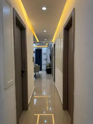 a hallway with two doors and a hallway with a room at Lujoso apartamentos en boca chica in Cuevas