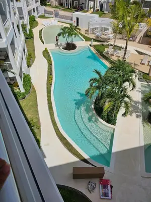an overhead view of a swimming pool at a resort at Garden Breeze Penthouse & Pool View l Mistral 401 in La Laguna