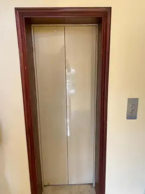 a glass door to a shower in a room at Stylish 3BR Condo, Full AC, Wi-Fi in Santo Domingo