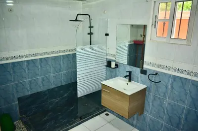 a bathroom with a sink and a mirror at Hogar cerca de la playa in Punta Cana