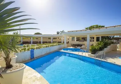 a swimming pool in front of a house at Bubble Glamping, King bed, we have a 8 units like this in Sosúa