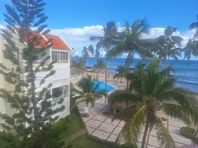 a view of the ocean from the balcony of a resort at marina view in La Puntica de Juan Dolio