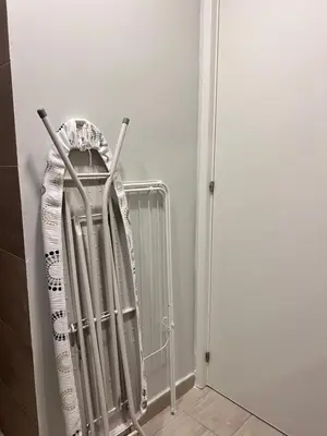 a metal radiator in the corner of a room at 2Bedroom Apt Pool Beach Restaurants in Punta Cana