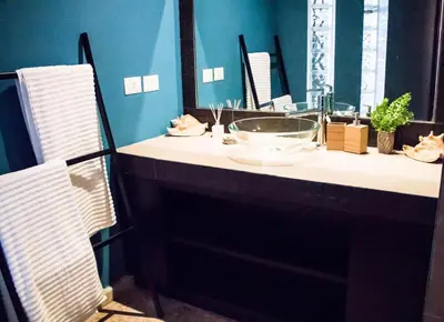 a bathroom with a sink and a mirror at BEACH FRONT 3 Bedroom Villa with Pool Sleeps 7 in Las Terrenas