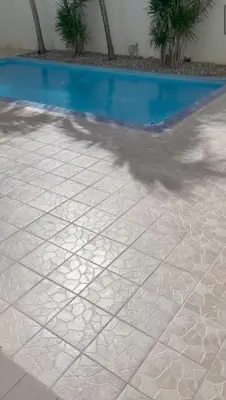 a swimming pool with at Residencial flor Betania in San Pedro de Macorís
