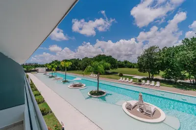 an image of a swimming pool at a resort at Sea Escape Casa Tortuga @ Cana Rock 1 Bdrm Bliss in Punta Cana