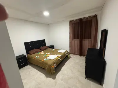 a bedroom with a bed and a window in it at Apartmento Las Palmeras 1 A1 in Vicente Noble