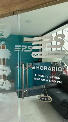 a window of a store with a sign on it at Beautiful 2 bedroom apartment Playa Nueva Romana in Boca del Soco