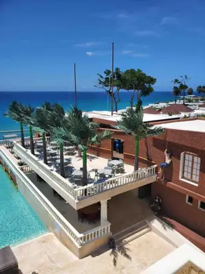 an aerial view of a resort with a pool at Villa Solana in Oceanfront Com Sosua Ocean Village in Sosúa