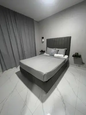 a bedroom with a large bed in a room at Cerca del aeropuerto los frailes I in Los Frailes