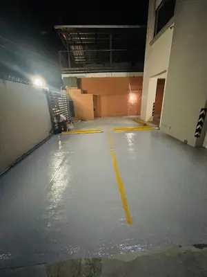 an empty parking lot in a building at night at Cerca del aeropuerto los frailes I in Los Frailes