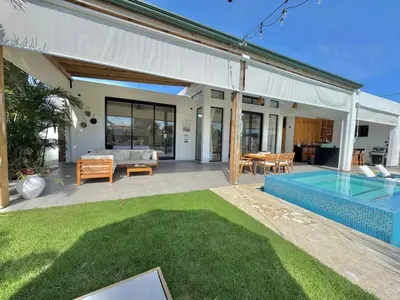 a villa with a swimming pool and a house at Villa Solana in Cabrera Dominican Republic in Cabrera