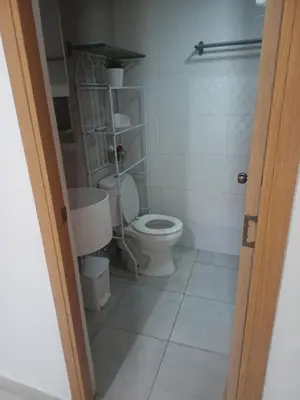 a bathroom with a toilet in a room at Vista Colonial, en el Residencial Riviera Colonial in Calero