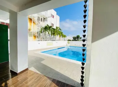 a swimming pool in the middle of a building at Cozy apartment in Licey al Medio in Licey al Medio