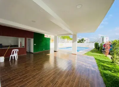 a living room with a wooden floor and a pool at Cozy apartment in Licey al Medio in Licey al Medio
