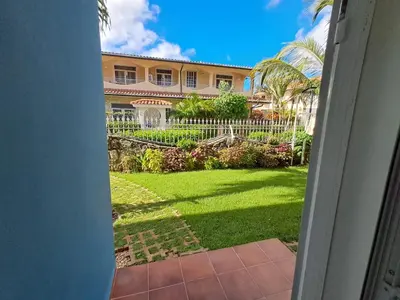 a view from the door of a house with a yard at Apartamentos Cayuco 28 in La Laguna