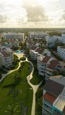 an aerial view of a city with buildings and a park at Playa Privada | Terraza & Piscina • WiFi Rápido in Punta Cana