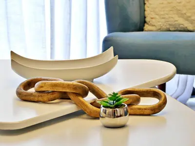 a pile of pretzels on a table with a plant at Acogedor y Familiar in Colorado