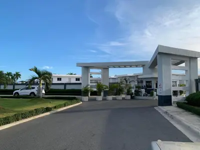 a parking lot in front of a building at Seaside Elegance in Baní