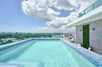 a swimming pool on top of a building at Erasmo in Colorado
