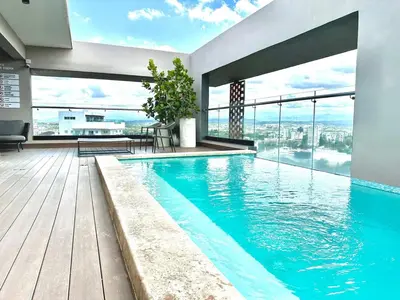 a swimming pool with a view of a building at Master Suite Rialto Residences in Colorado