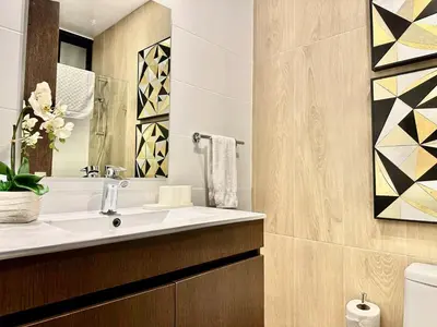 a bathroom with a sink and a mirror at Master Suite Rialto Residences in Colorado