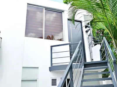 a staircase leading up to a house with a window at Mini Hogar 4 in Colorado