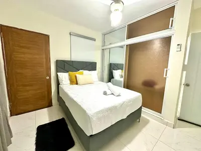 a bedroom with a bed with a large window at Vista Central in Colorado
