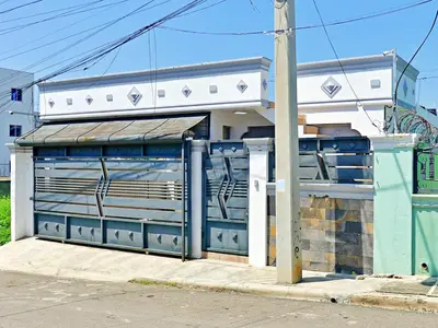a blue building on the side of a street at Casa Elegante in Colorado