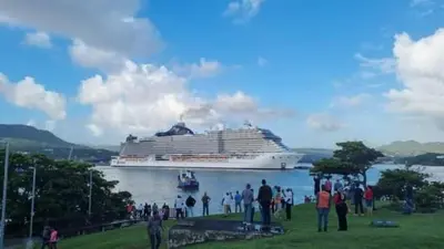 a cruise ship in the water with a group of people at One bedroom apartment in the center with a pool in Sosúa