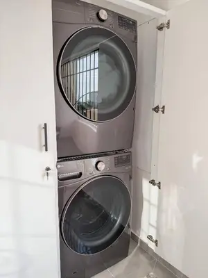 a washing machine with a mirror on top of it at Stylish Sosua 2 BR apartment near everything in Sosúa