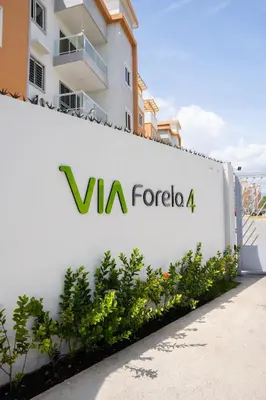 a sign for vla forcoica on a building at apartamento vacacional BANI in Boca Canasta