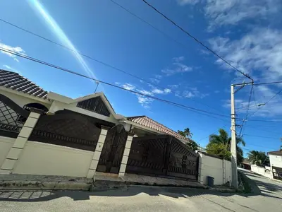 a house with a gate and a fence at villa fortuna in Nagua