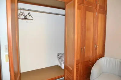 a room with a closet with a cupboard at Comfortable Apartment, Torre Alta in San Felipe de Puerto Plata