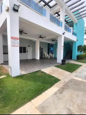 a view of the back of a house at Palma Real Near Cibao Airport in Santiago de los Caballeros