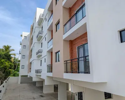 an image of an apartment building with balconies at Prado Garden Hotel in Monte Plata